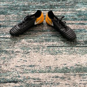 A pair of Nike tiempo soccer cleats